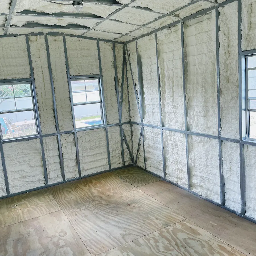 Closed-cell spray foam insulation applied to wall cavities in a residential project in Helena Valley Southeast